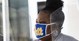 Pitt employee wearing a mask 